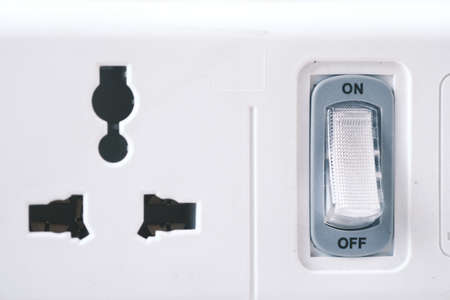 Electrical switch and plug on color background,の写真素材