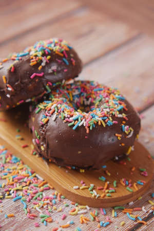 chocolate donuts on plate with copy spaceの写真素材