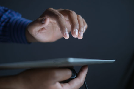 businessman using digital tablet on office deskの写真素材