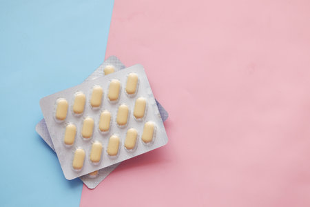 Close up of pills of blister pack on tableの写真素材