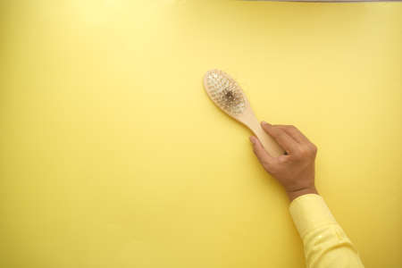 a brush with lost hair on tableの写真素材