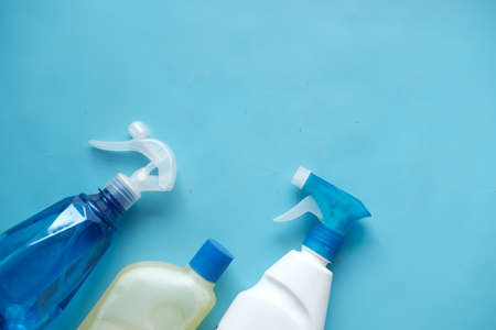 close up of cleaning bottle on blue backgroundの写真素材