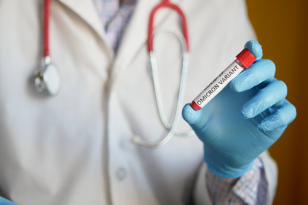 hand hold omicron variant corona virus blood test tubeの写真素材