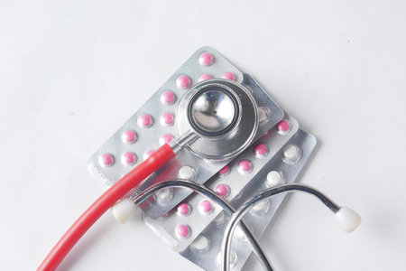 Close up of hand holding blister packs .の写真素材
