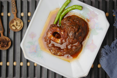 traditional Indian curry lamb masala in a bowl on tableの写真素材