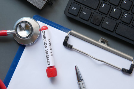 omicron variant corona virus blood test tube on red backgroundの写真素材
