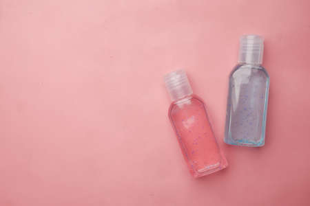 hand wash liquid in a container on pink backgroudの写真素材