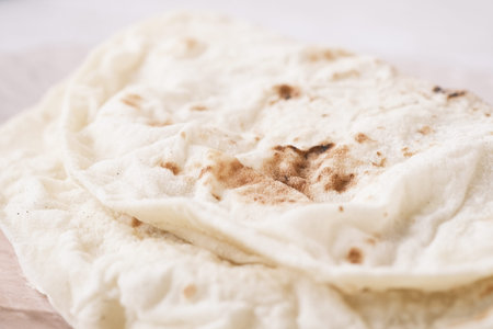 homemade roti chapati on table .