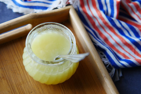 homemade ghee in container on a table ,
