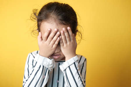 a upset child girl looking downの写真素材