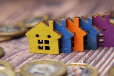 colorful wooden houses on white , the concept of finance conceptの写真素材