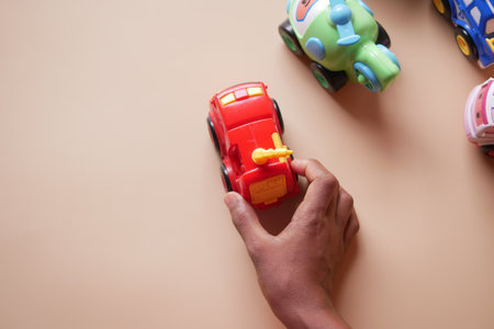 colorful plastic toys on blue backgroundの写真素材
