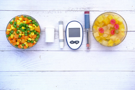 diabetic measurement tools and healthy food on tableの写真素材