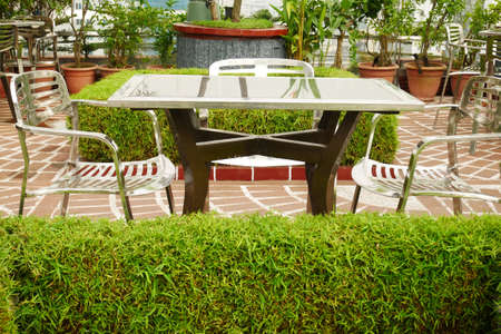 many empty chair at cafe in a parkの写真素材