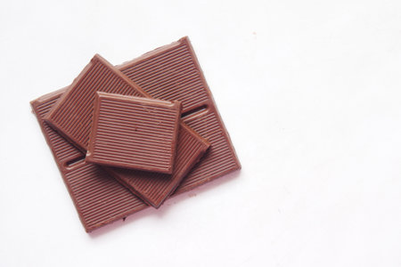 dark chocolate on a plate on white backgroundの写真素材