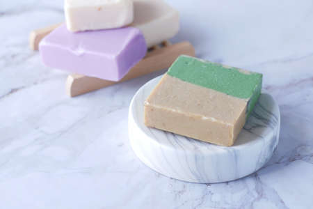 Homemade natural soap bar on black backgroundの写真素材
