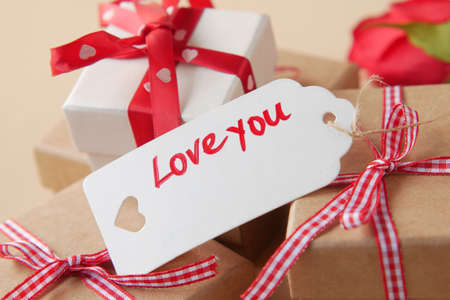 love you text on a paper with gift box on tableの写真素材