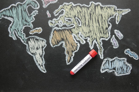 omicron variant virus blood test tube and world map