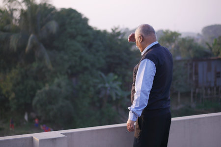 senior man looking away in park