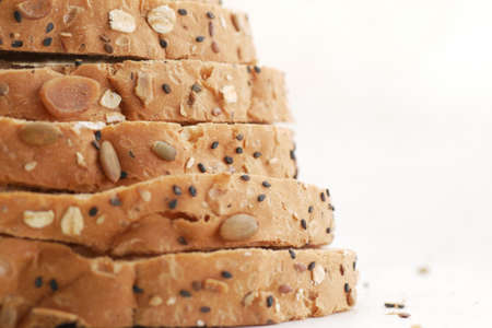 detail shot of whole grain baked bread on tableの写真素材