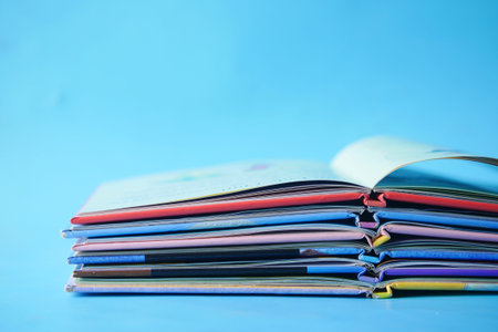 colorful carton books on blue background