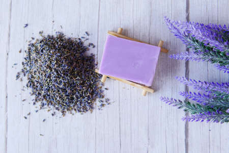 top view of Homemade soap with dried lavender on table with copy spaceの写真素材