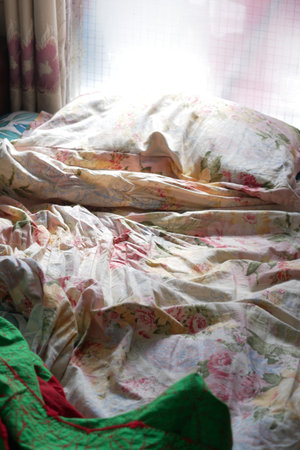 messy bed in early morning , messy bed after waking up
