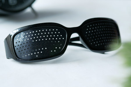Perforation glasses with holes for training visionの写真素材