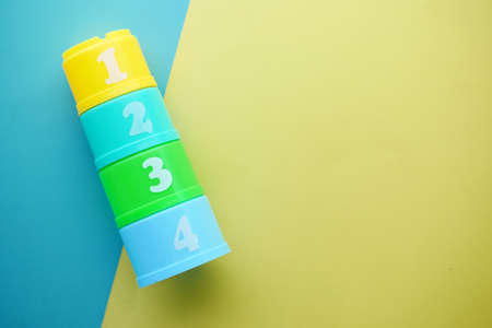 colorful plastic numbers on color background,の写真素材