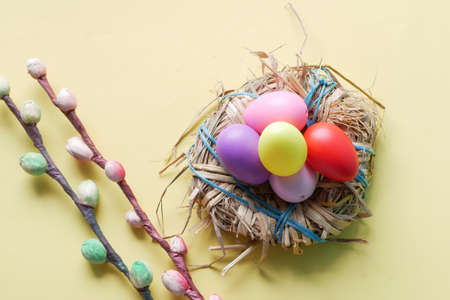 easter concept with multi color egg on pink background.の写真素材