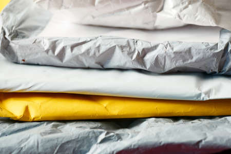 stack of many delivery package close upの写真素材
