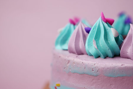 purple and green color birthday cake on color backgorund
