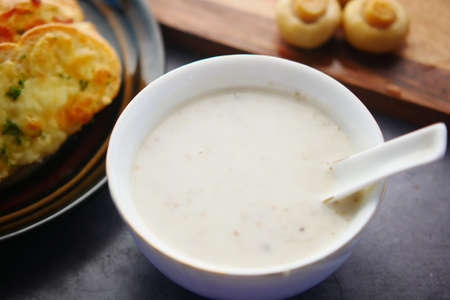 A bowl of homemade cream of mushroom soupの写真素材