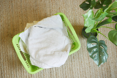 top view of Clothes in basket on floor