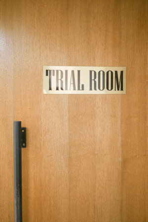 Sign of a trial room on a doorの写真素材