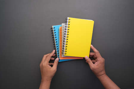high angle view of color notepads on color backgroundの写真素材