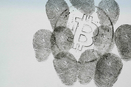 dhaka bangladesh, 21th January 2022, bitcoin sign and black fingerprints paper