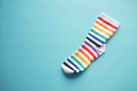 colorful sock on green background with copy space ,の写真素材