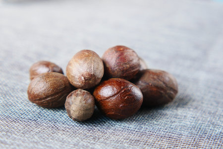 Ground nutmeg on table close up ,