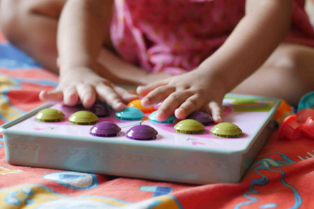 toddler playing with counting math learning toy .の写真素材