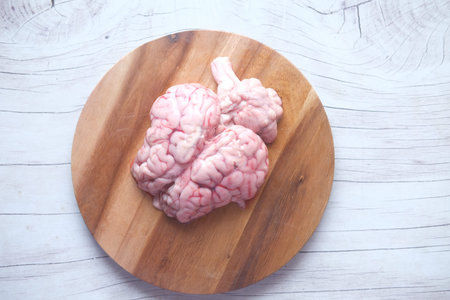 top view of mutton brain on a chopping board