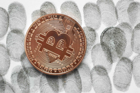 dhaka bangladesh, 21th January 2022, bitcoin sign and black fingerprints paper