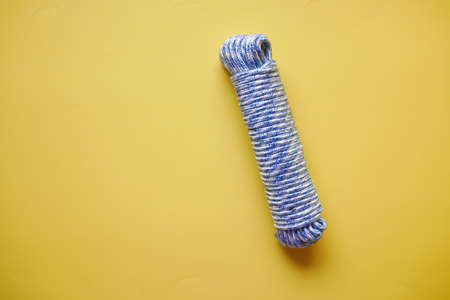 Roap texture on a yellow background top viewの写真素材