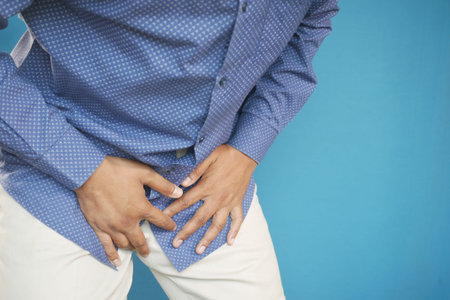 the concept of prostate and bladder problem, crotch pain of a young person