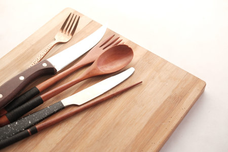 wooden chopping board on black background top down