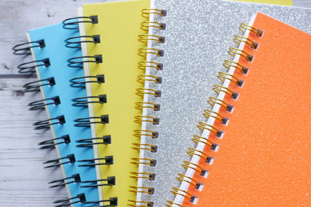 high angle view of color notepads on color background