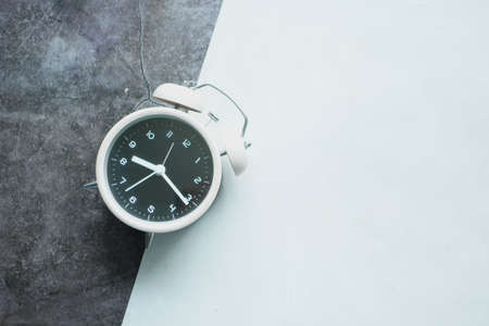 old alarm clock on color background.の写真素材