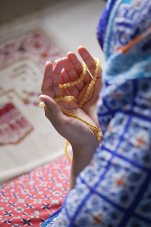 Close up of muslim women hand praying at ramadan