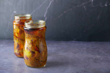 Homemade Mango Pickle in a glass jar on table ,の写真素材