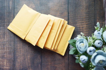 yellow paper bubble envelope on table